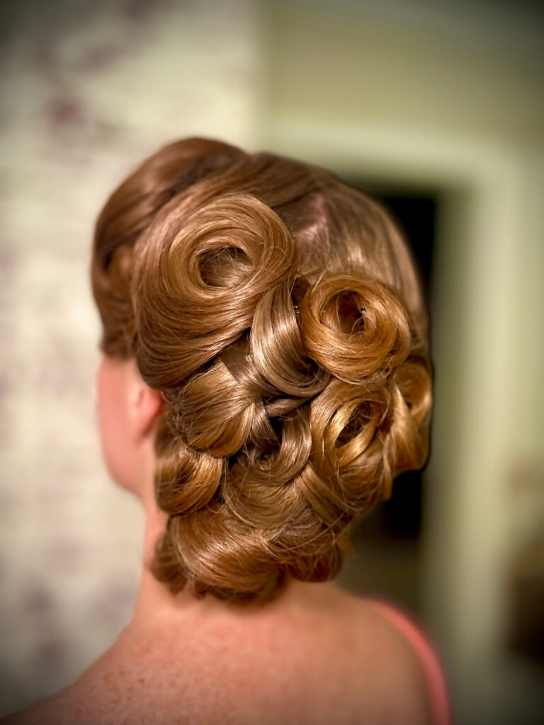 My sculpted vintage pin-curl updo, viewed from behind.